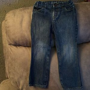 Boys 4T jeans. One little tear at the very bottom on one leg as pictured.